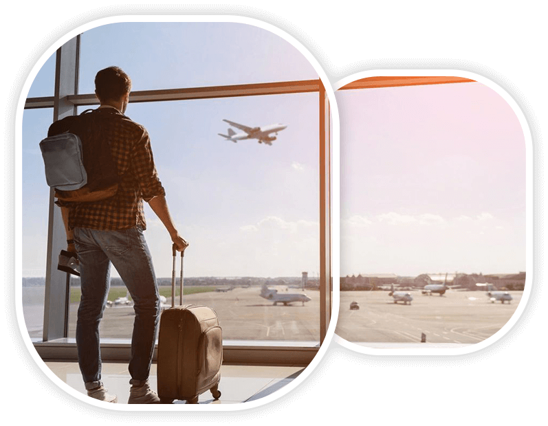 A man standing in front of an airport window.